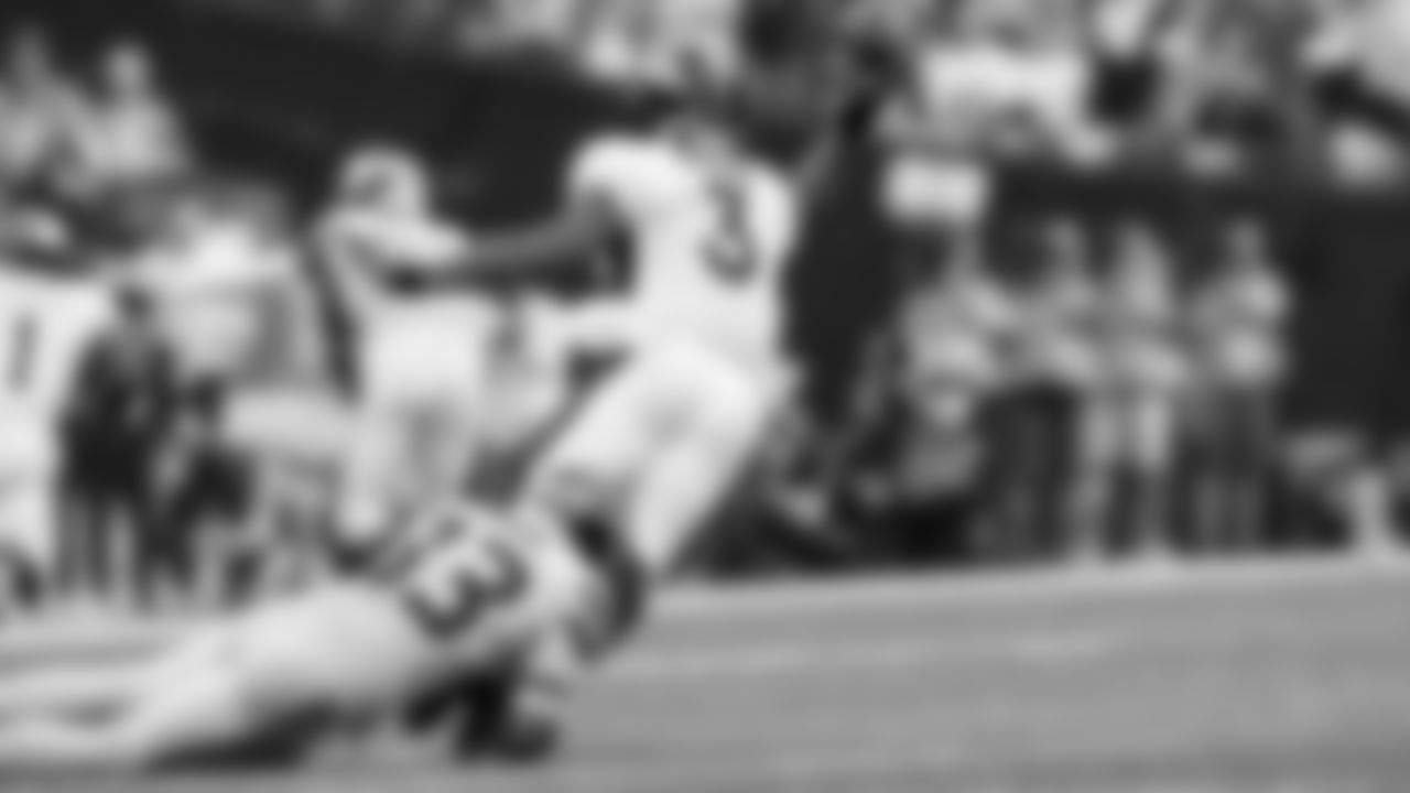 Seahawks safety Jamal Adams forces Denver's Russell Wilson into throwing an incomplete pass.