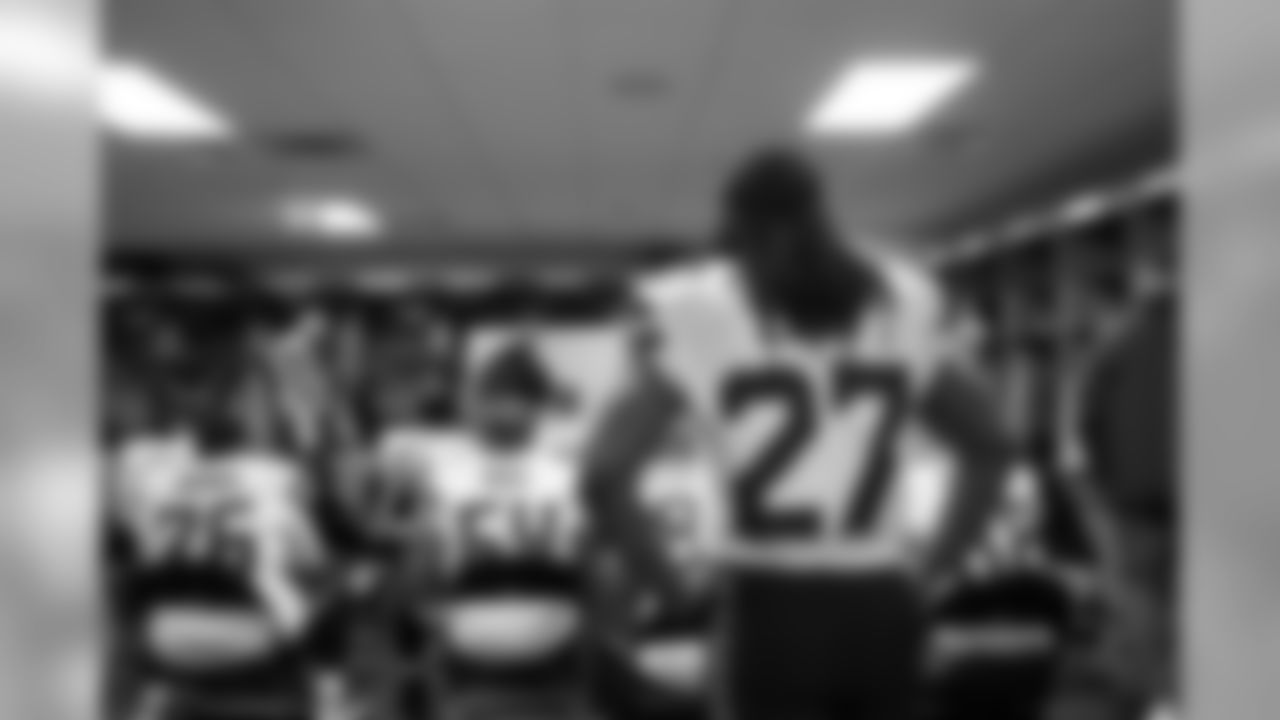 At halftime, Eddie Lacy and offensive teammates paid attention as assistant coach Tom Cable diagrammed on the white board in the locker room.
