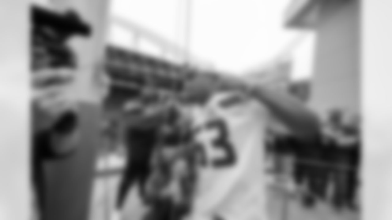 Super Bowl XLVIII MVP Malcolm Smith raises the 12 Flag for Week 3 vs. Panthers at Lumen Field on Sunday, September 24, 2023.