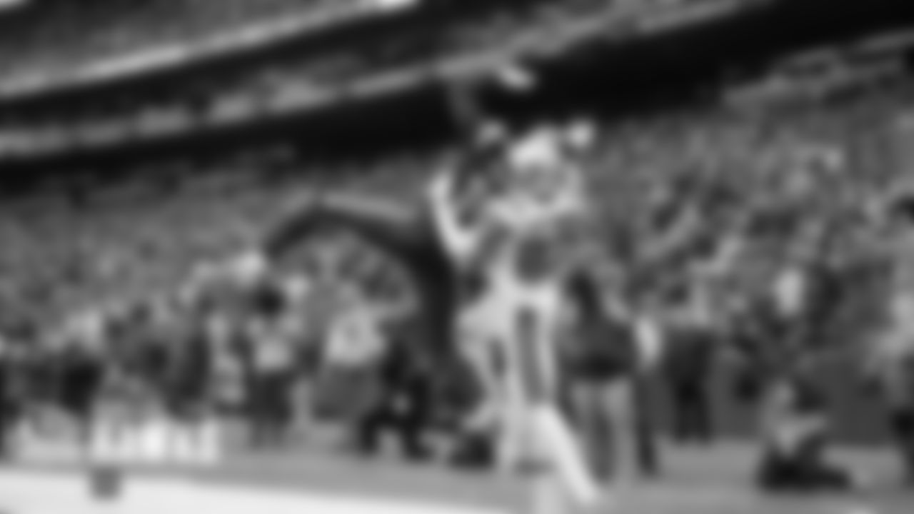 Seahawks receiver DK Metcalf leaps but can't make the catch in the corner of the end zone with Saints cornerback Marshon Lattimore defending.