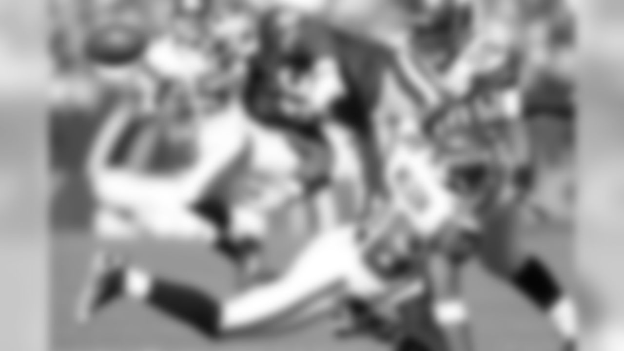 San Francisco 49ers heads tight end Delanie Walker (46) fumbles during an NFL game against the Seattle Seahawks, Sunday, Oct. 26, 2008 in San Francisco. (AP Photo/Greg Trott)