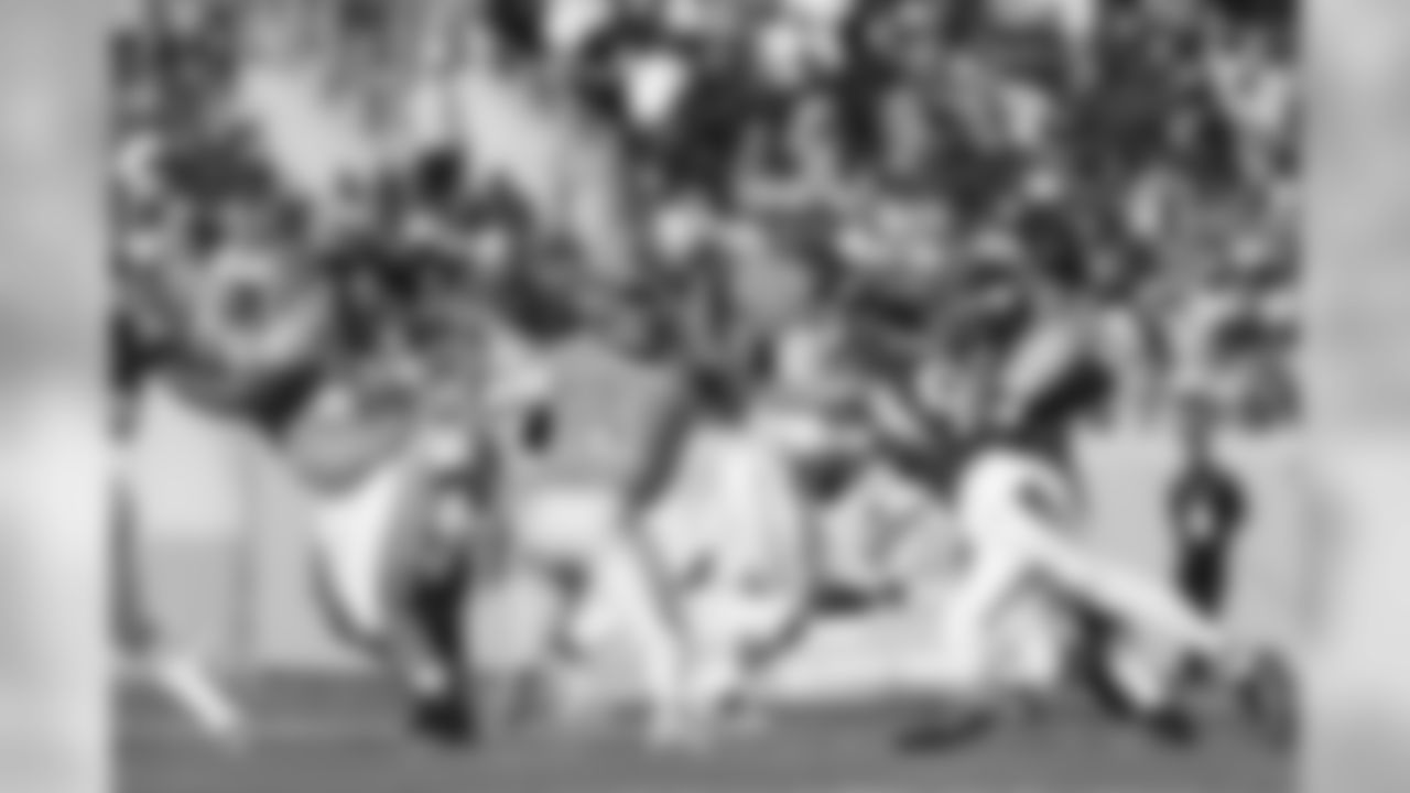 Seattle Seahawks quarterback Russell Wilson (3) scrambles away from pressure from Pittsburgh Steelers outside linebacker T.J. Watt (90) during the NFL Pro Bowl football game, Sunday, Jan. 26, 2020, in Orlando, Fla. The AFC team won 38-33. (Aaron M. Sprecher via AP)