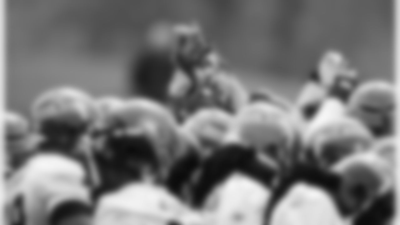 The defense huddles during practice