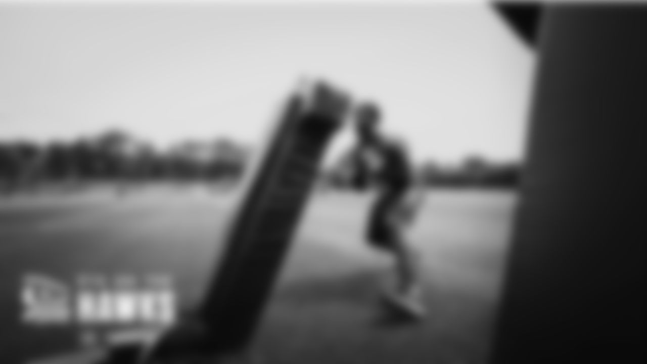 Seahawks running back Kenneth Walker III works on his pass-blocking technique.