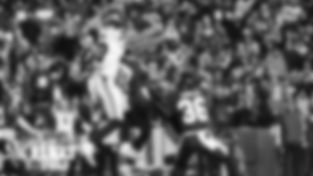 Seahawks receiver Freddie Swain battles in the end zone but the two-point conversion attempt is intercepted.