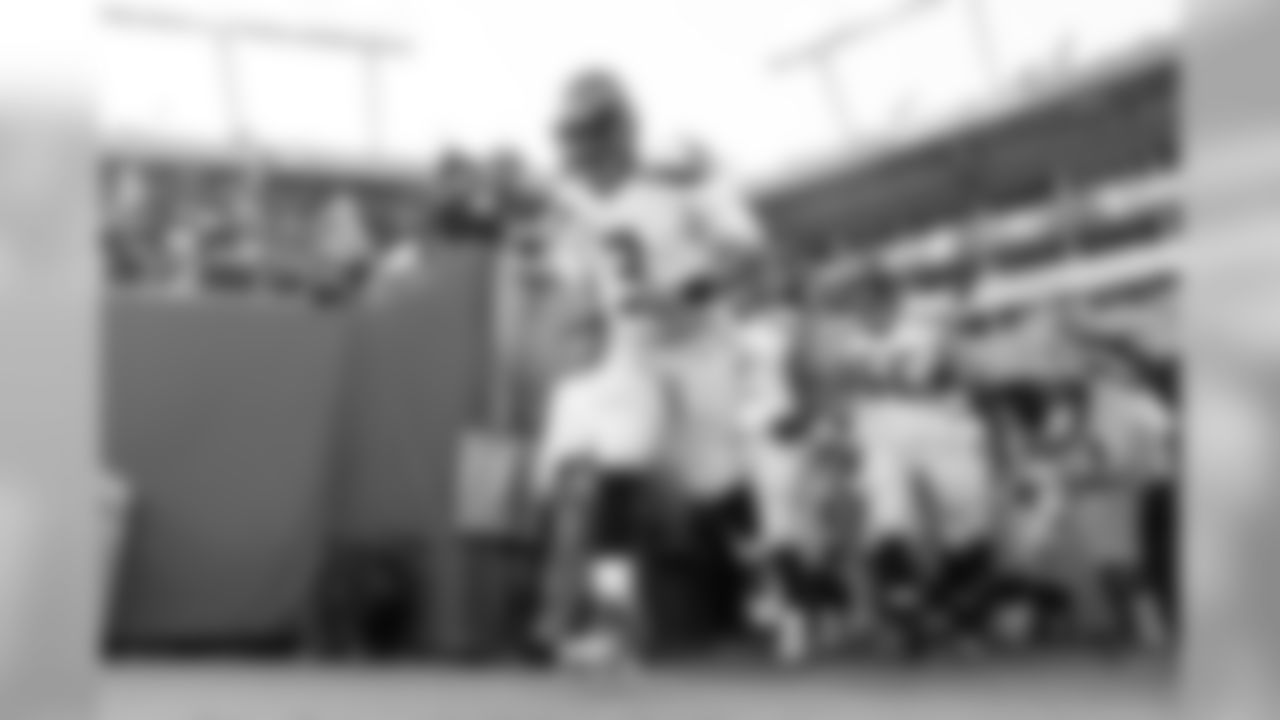 Quarterback Russell Wilson leads the Seahawks onto the field for the game against the Bucs.