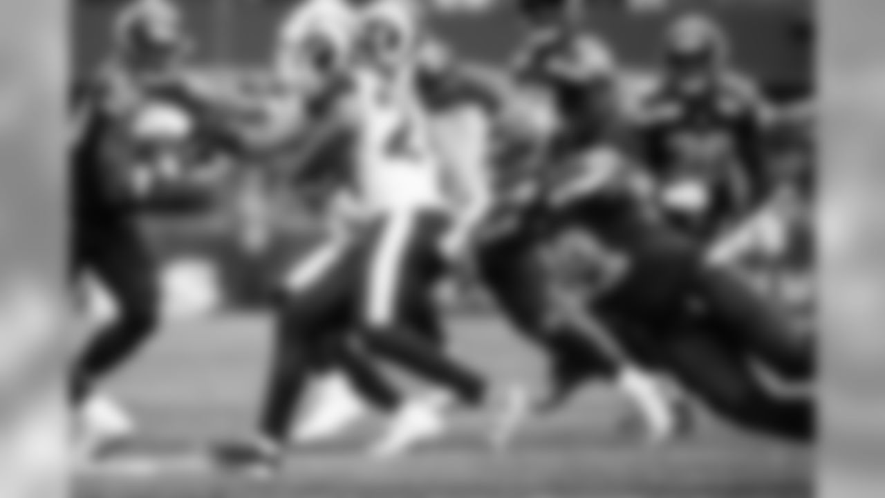 Seattle's Shaquem Griffin dives at Los Angeles returner Blake Countess.