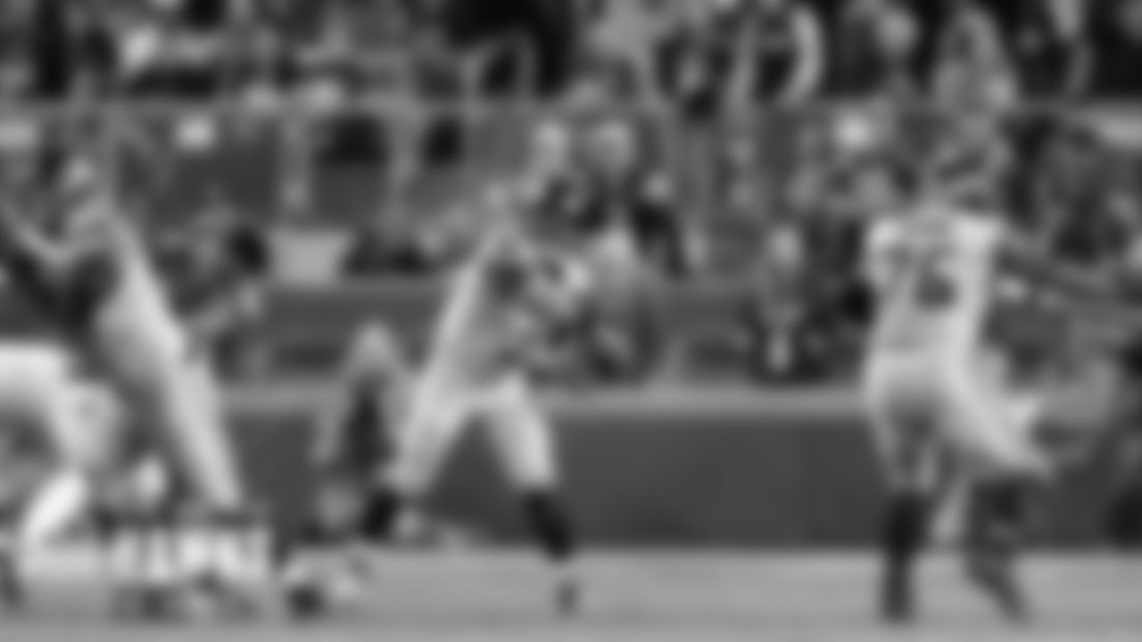 Seahawks quarterback Russell Wilson throws from the pocket as Mike Iupati and Duane Brown provide protection.