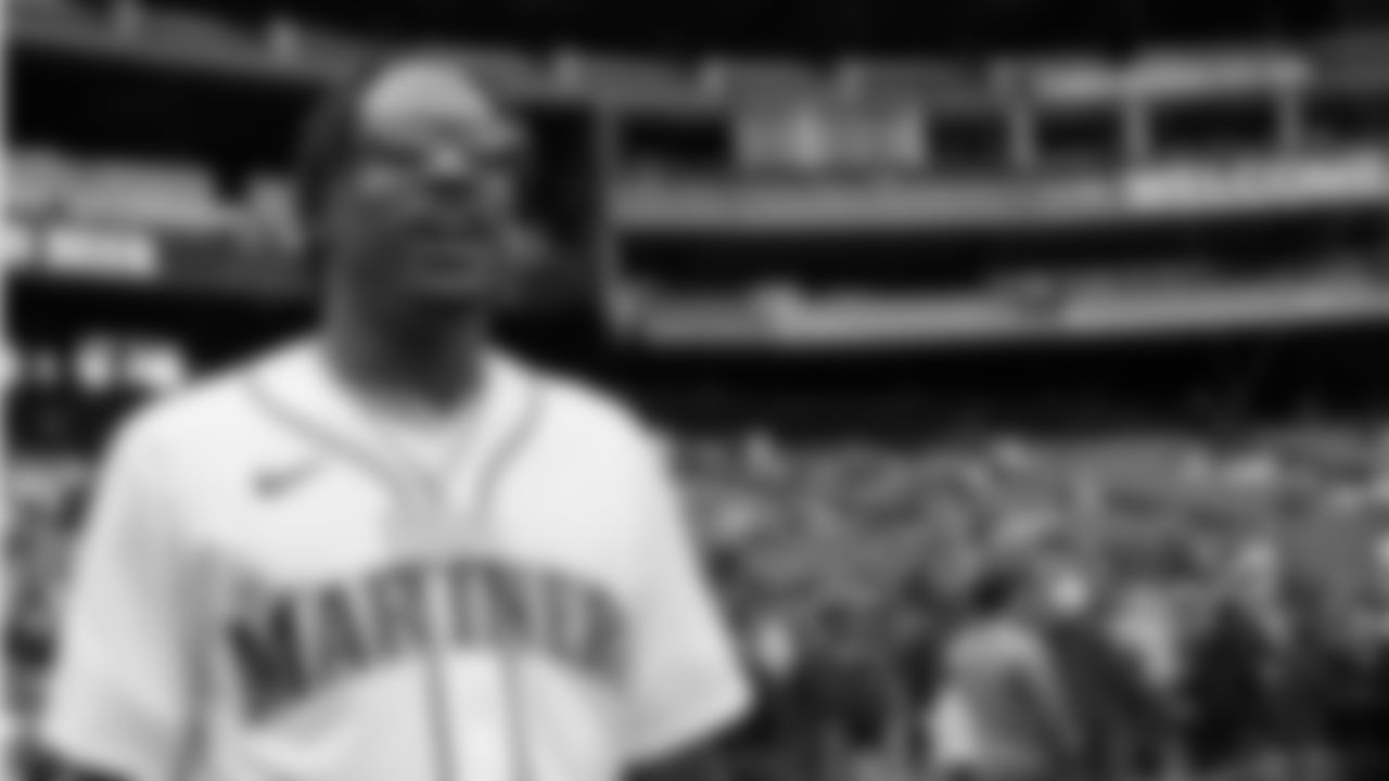 Seahawks cornerback Tariq Woolen throws out the ceremonial first pitch prior to a Mariners game at T-Mobile Park on April 23, 2023.