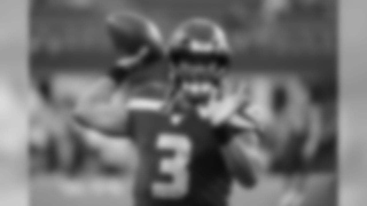 Seattle Seahawks quarterback Russell Wilson passes during warmups before an NFL football preseason game against the Oakland Raiders, Thursday, Aug. 29, 2019, in Seattle. (AP Photo/Elaine Thompson)