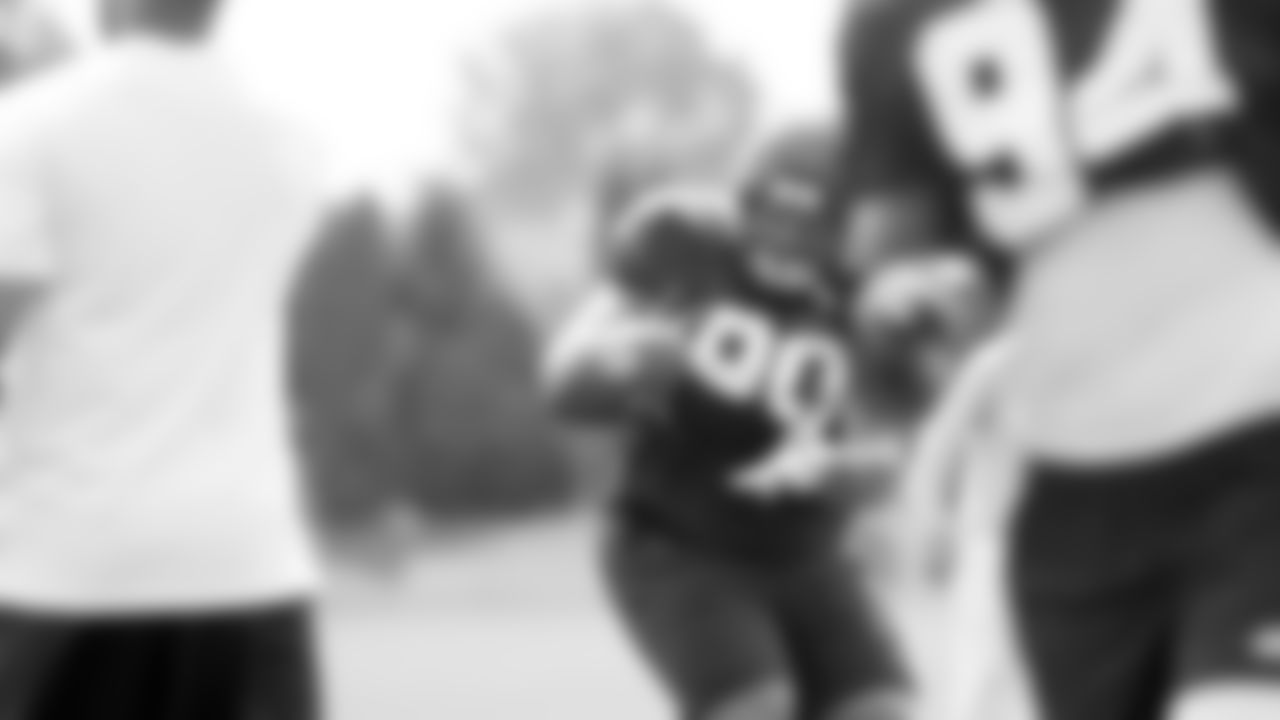 Seahawks players take the field for Training Camp practice #12 on August 12, 2021.