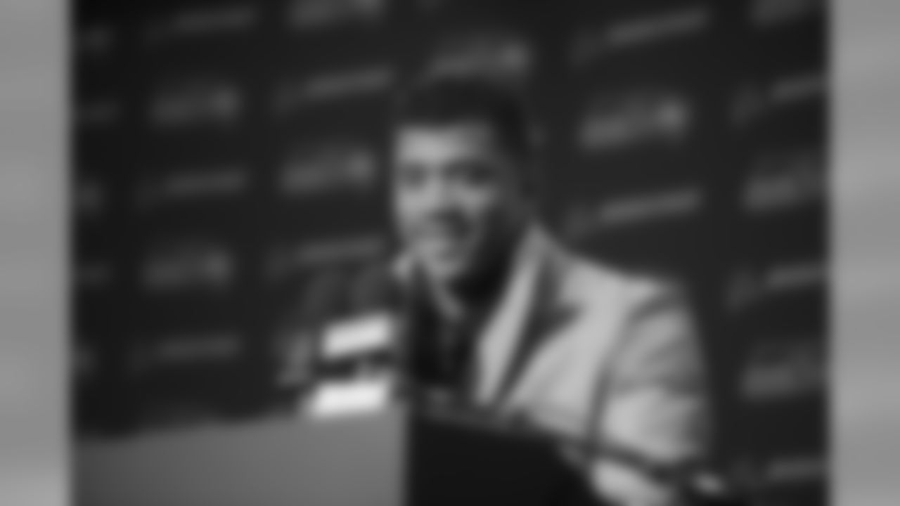 Quarterback Russell Wilson addresses the media after the game. Wilson threw three touchdown passes with no interceptions for the fifth straight game, the first time an NFL quarterback has ever done so.