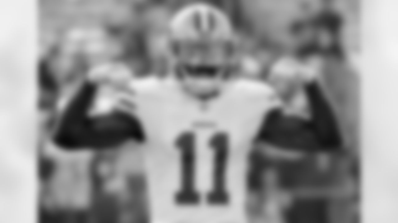 FILE - In this Dec. 31, 2017, file photo, San Francisco 49ers wide receiver Marquise Goodwin gestures as he comes onto the field before an NFL football game against the Los Angeles Rams, Sunday,, in Los Angeles. The 49ers have signed Goodwin to a three-year contract extension, Thursday, March 8, 2018. NFL Network reported that Goodwin's new contract is worth $20.3 million with $10 million in guarantees. (AP Photo/Rick Scuteri, File)