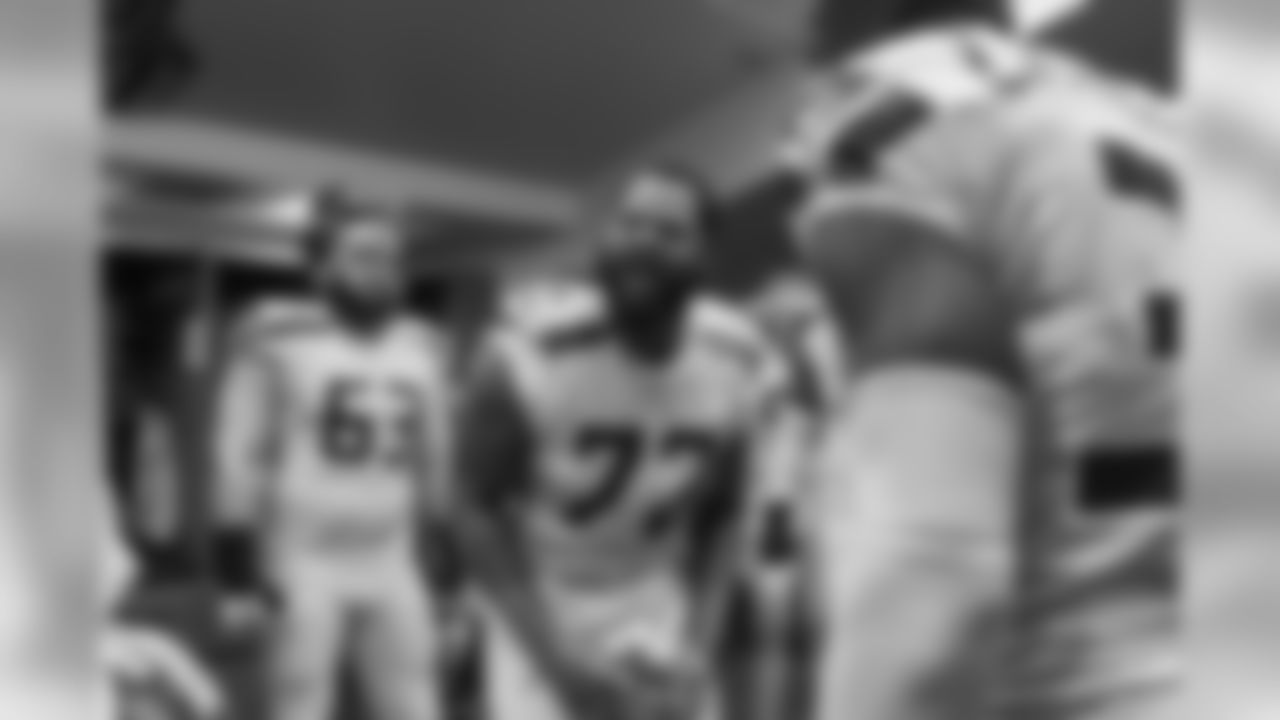 Michael Bennett gets his teammates pumped up before the game.