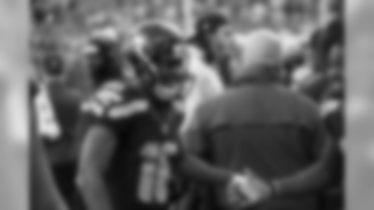 [January 2, 1994]: Chiefs 34- Seahawks 24Seattle Seahawks quarterback Rick Mirer attempts to elude Derrick Thomas during an NFL Football game against the Kansas City Chiefs on January 2, 1994 in Kansas City, Missouri. The Chiefs defeated the Seahawks 34-24. (AP Photo/G. Newman Lowrance)