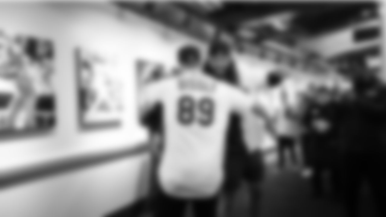 Seattle Seahawks tight end Will Dissly throws out the ceremonial first pitch at the Seattle Mariners game on April 21, 2022 at T-Mobile Park.