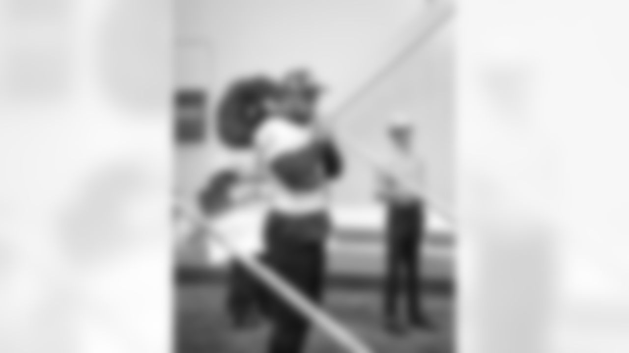 Seahawks players attempt to play the alphorn at the Virginia Mason Athletic Center on November 9, 2022.
