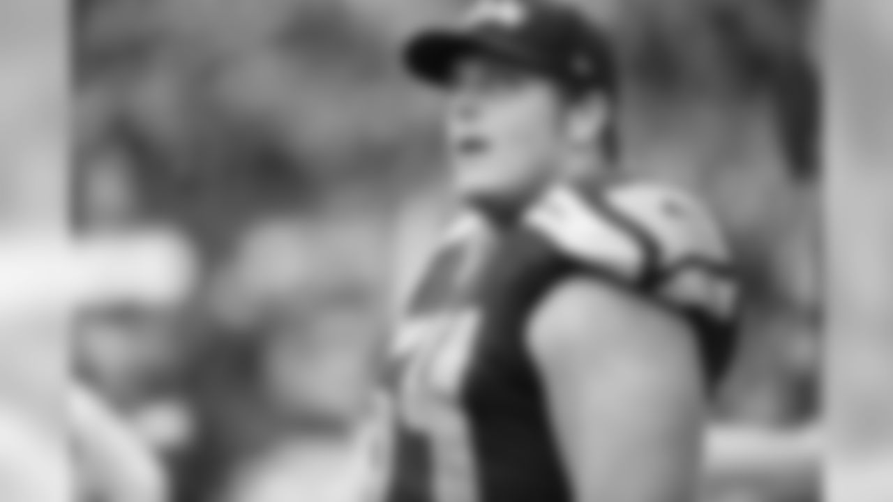 [September 14, 1986]: Seahawks 23- Chiefs 17Quarterback Todd Blackledge (14) of the Kansas City Chiefs, is grabbed by Jacob Green (79) of the Seattle Seahawks and sacked for a four-yard loss during the second quarter of their NFL game, Sept. 14, 1986. Also rushing Blackledge is Joe Nash (72) of the Seahawks. Seattle beat Kansas City 23-17. (AP Photo/Gary Stewart)