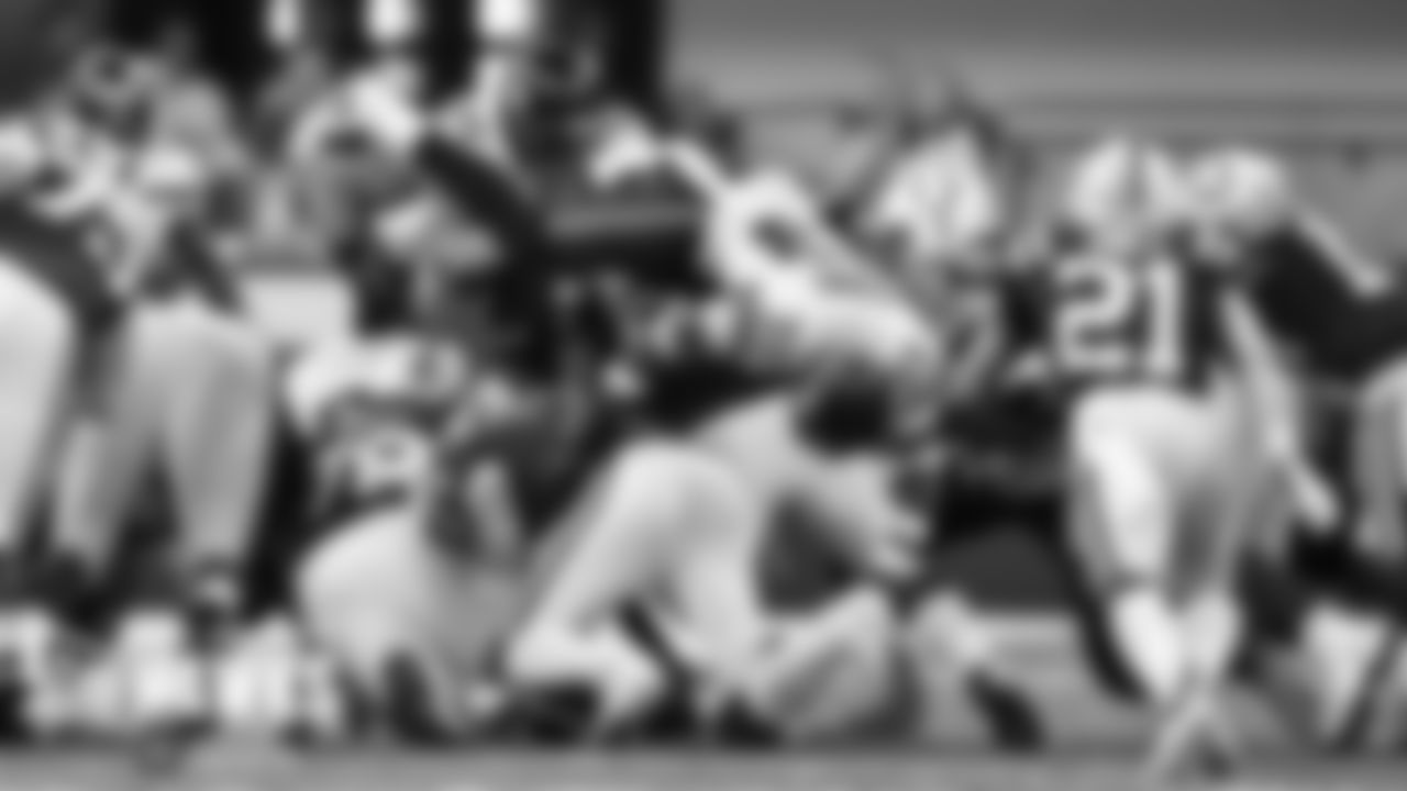 Seattle's Jamal Adams flies over the pile as the Seahawks defense held and recovered a fumble on this fourth down play.