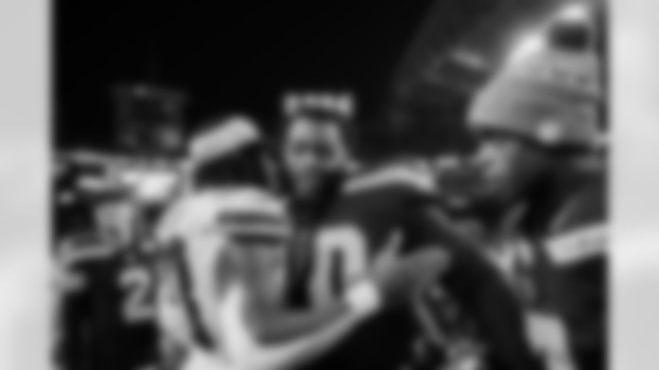 Seahawks guard Anthony Bradford (70) greets a member of the Dallas Cowboys after a preseason win over the Dallas Cowboys at Lumen Field in Seattle, Wash. on August 19, 2023.