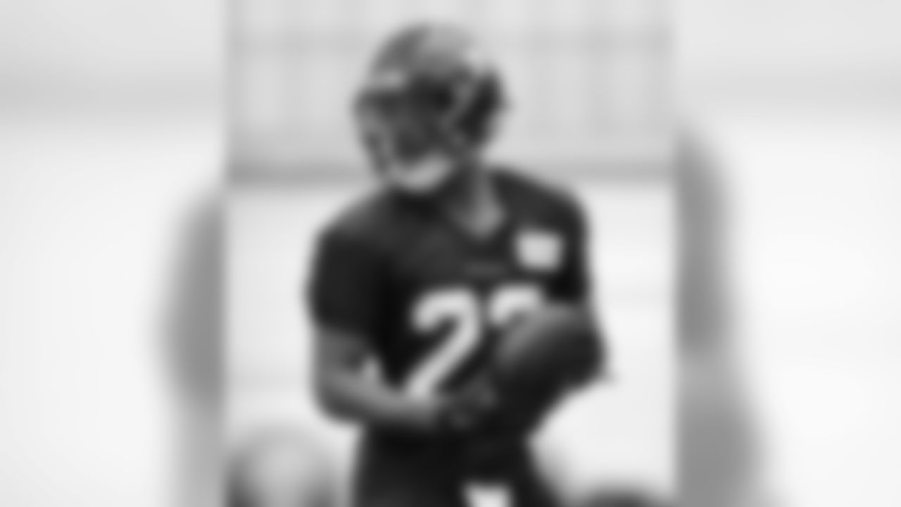 Seattle Seahawks' C.J. Prosise holds the ball during a rookie minicamp workout Sunday, May 8, 2016, in Renton, Wash. (AP Photo/Elaine Thompson)