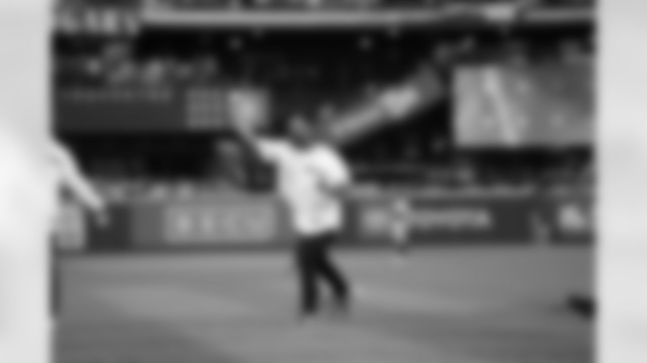 Seahawks Legend Marshawn Lynch throws out a first pitch as part of Mariners Opening Day at T-Mobile Park on March 30, 2023.