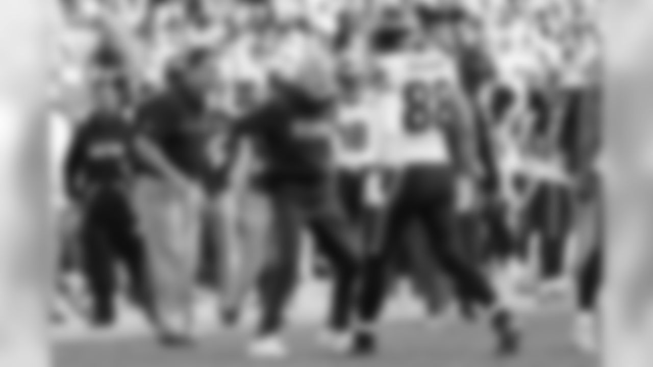 Head coach Pete Carroll shows his excitement as Jimmy Graham and the rest of the offense comes off the field after the touchdown. Graham's leaping reception at the one-yard line set up the score.