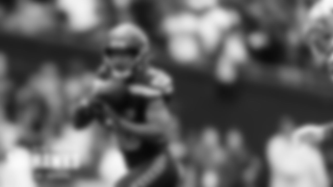 Seattle's Tyler Lockett races for yards after the catch on a 40 yard gain in the fourth quarter.