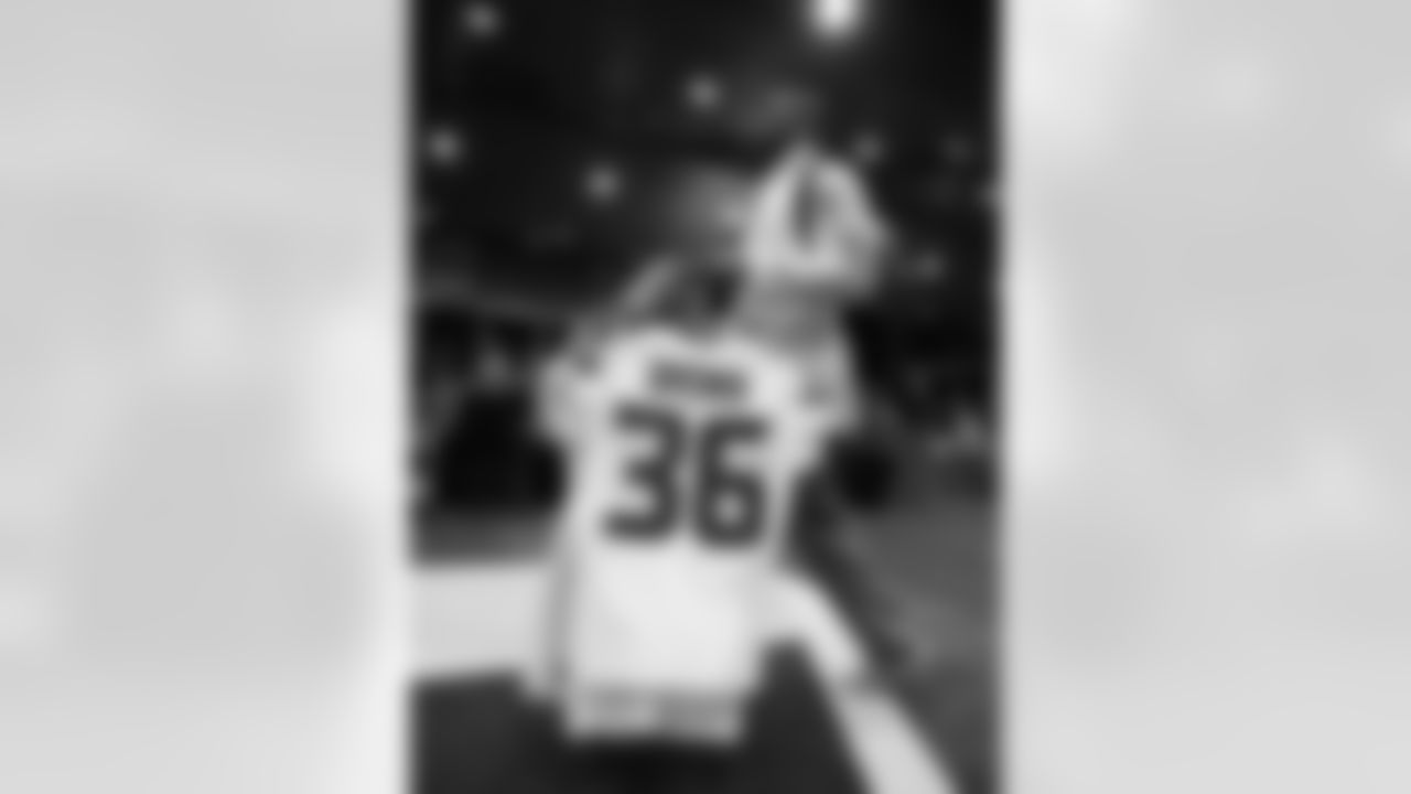 [October 12, 2003]: Seahawks 20- 49ers 19Seattle Seahawks' Antonio Cochran (78) celebrates a fumble recovery by teammate safety Ken Hamlin on the first play after the 2-minute warning in the fourth quarter against the San Francisco 49ers, Sunday, Oct. 12, 2003, in Seattle. The Seahawks won 20-19. At left is 49ers' Ron Stone. (AP Photo/Elaine Thompson)