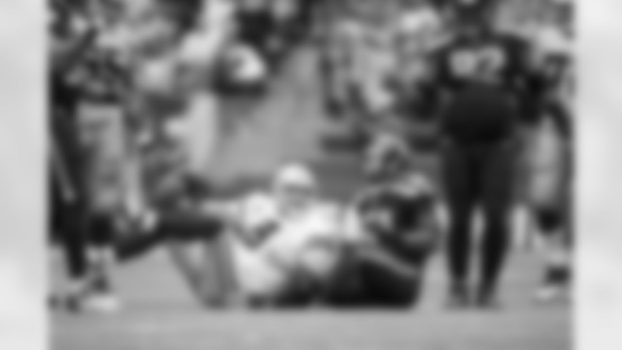 NFC Divisional Playoffs. [January 14, 2007]: Bears 27 - Seahawks 24 (OT) Chicago Bears kick returner Devin Hester (23) breaks away from Seattle Seahawks punter Ryan Plackemeier (1) while returning a kick in the NFC divisional playoff football game in Chicago, Sunday, Jan. 14, 2007. The play was called back because of a Bears penalty. (AP Photo)