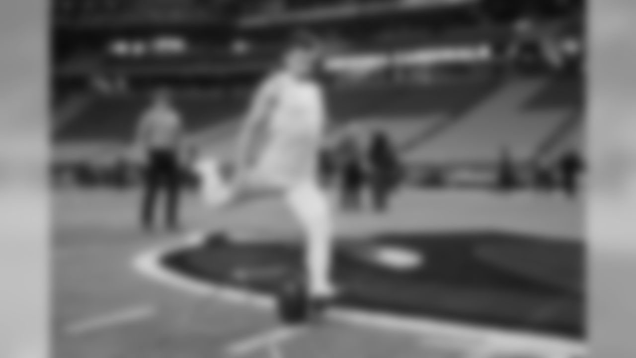 Kicker Blair Walsh warms up on the field prior to the game.