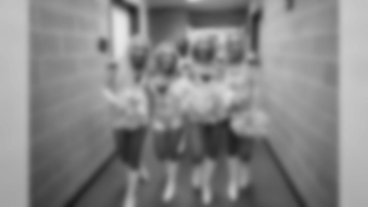 Shayne and fellow Dancers walking out of Seahawks Dancers locker room to the field.