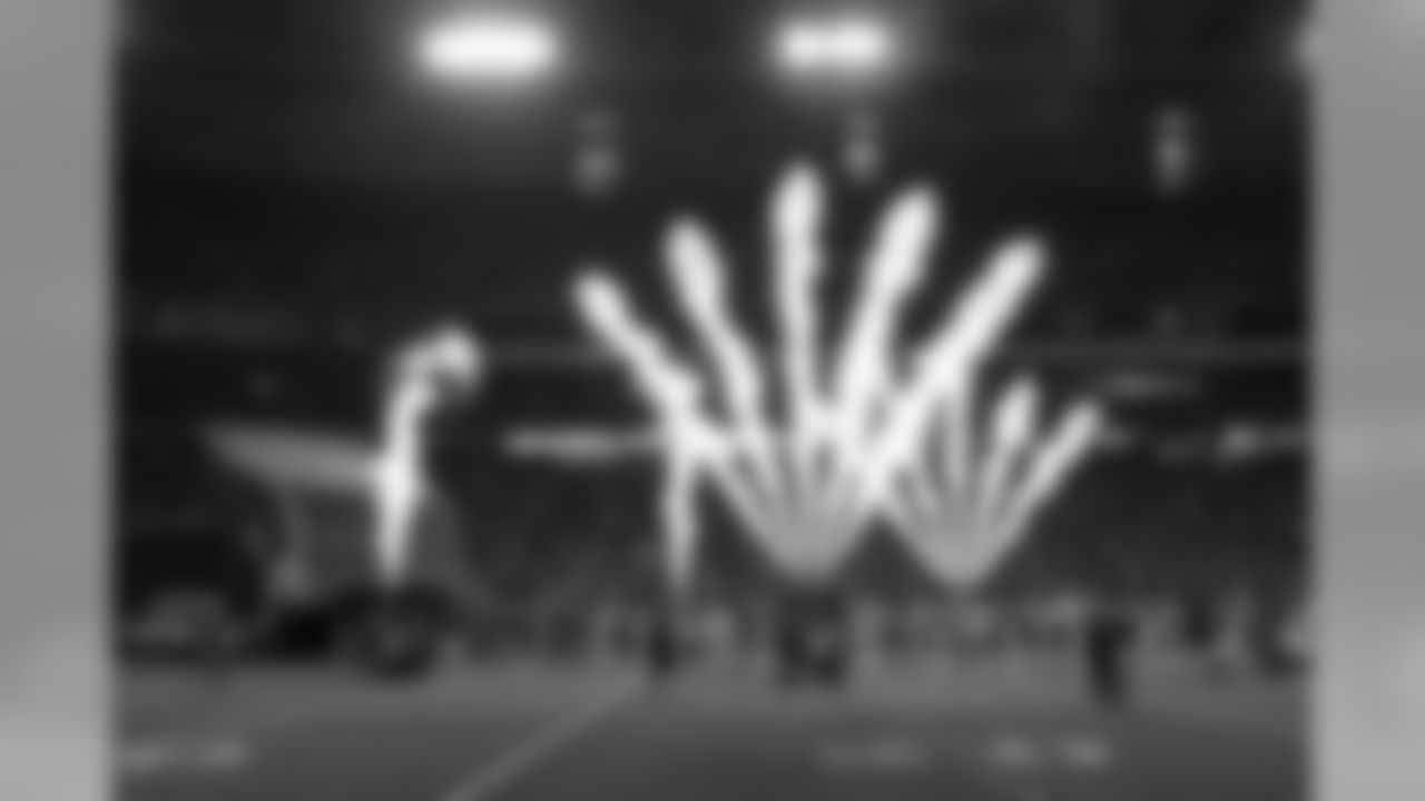 Pyrotechnics erupt in University of Phoenix Stadium as the home team is introduced.