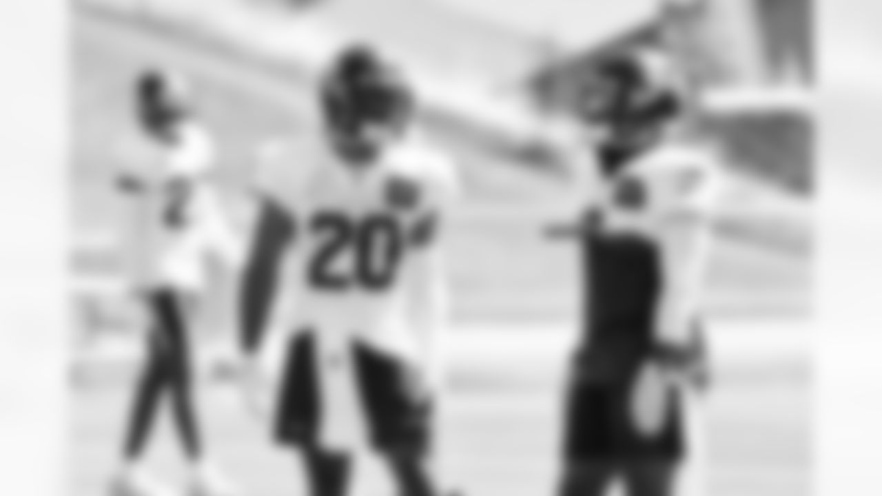 Seahawks safety Julian Love (20) and safety Quandre Diggs (6) at practice Sunday at the Virginia Mason Athletic Center in Renton, Wash. on Aug. 15, 2023.