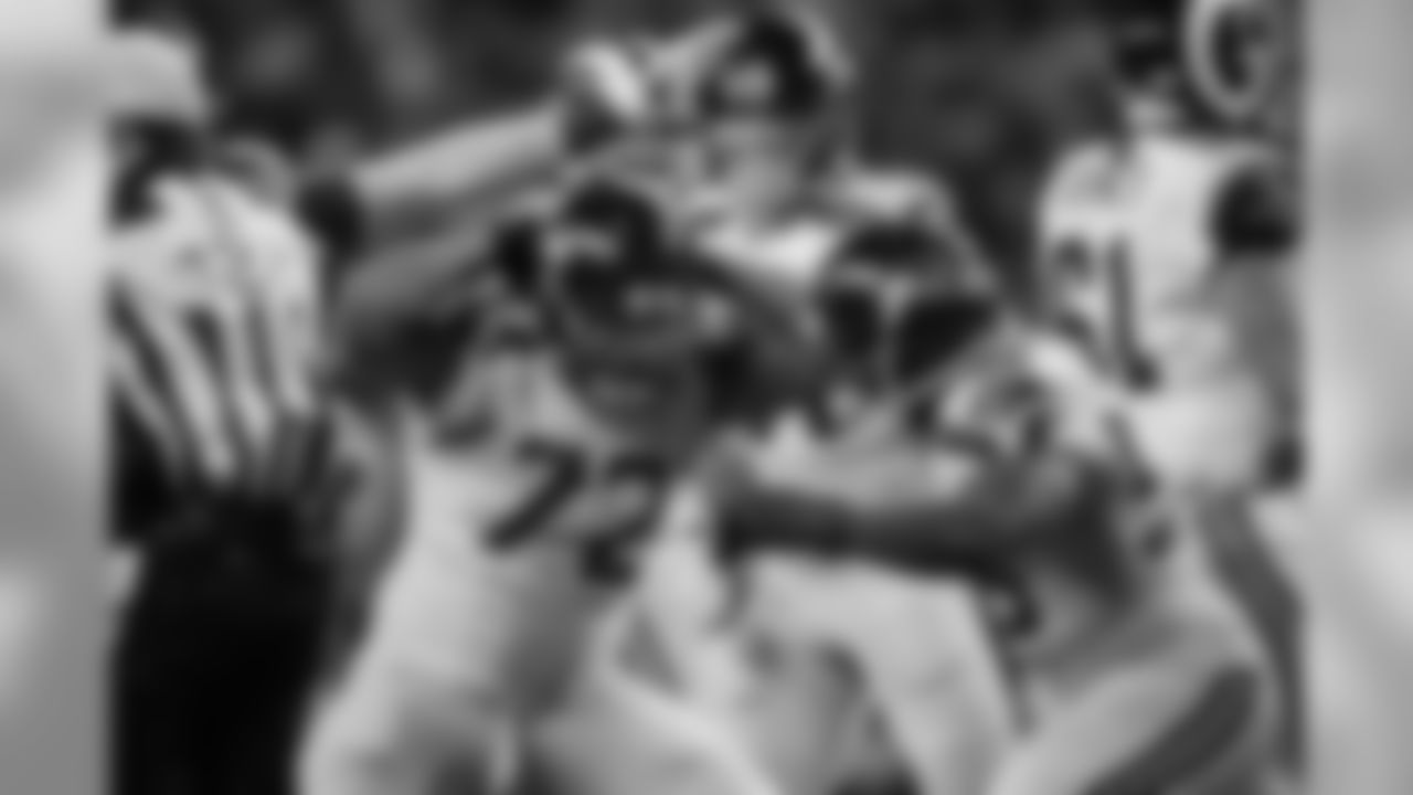 Michael Bennett celebrates his sack with Cliff Avril.