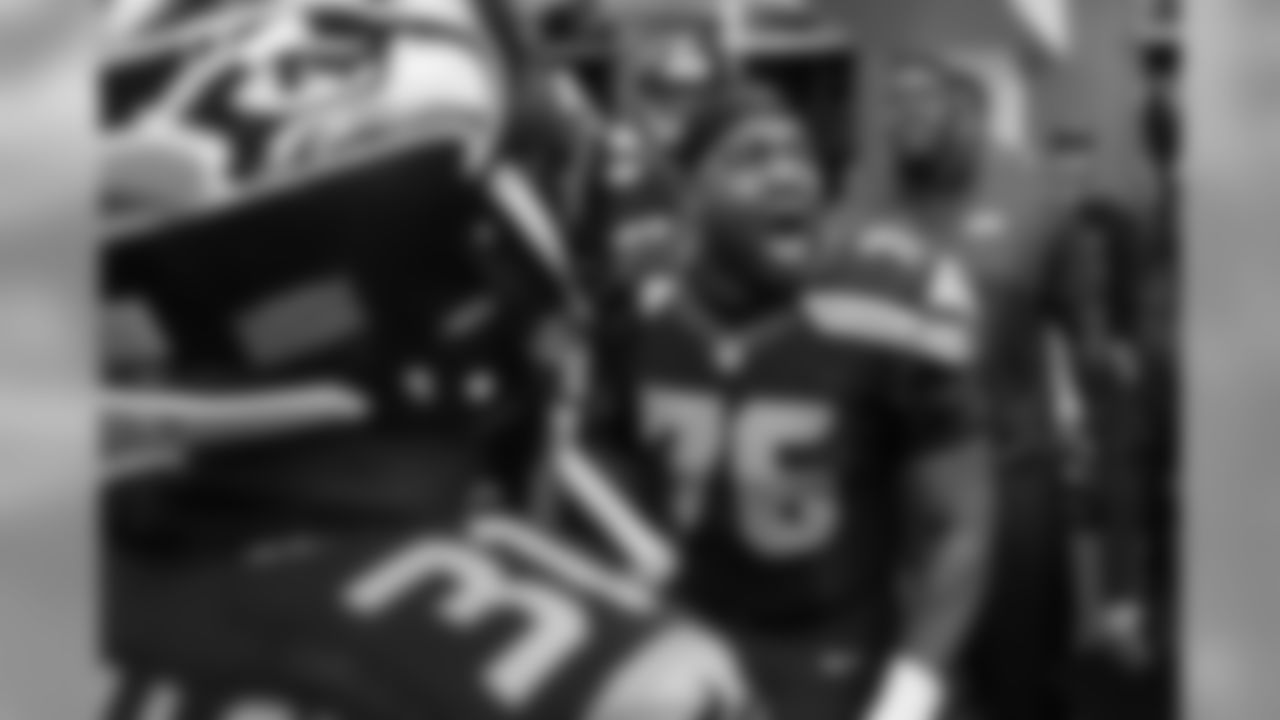 Offensive tackle Russell Okung fires up the Seahawks just before taking the field to face the Green Bay Packers in the NFC Championship game.