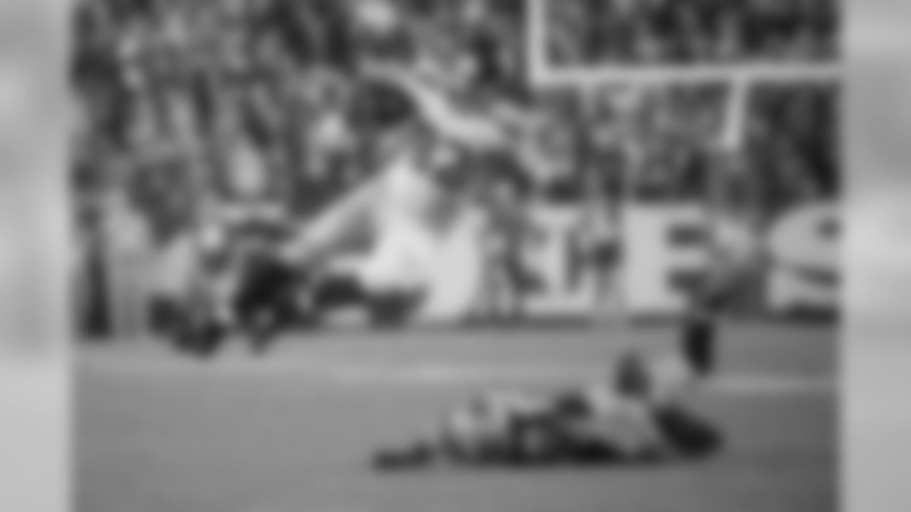 Seattle's Luke Willson catches big air as he escapes the would-be tackle by San Francisco's Chris Borland in the fourth quarter.