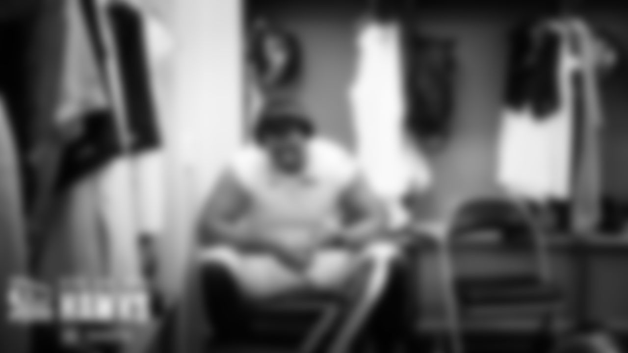 Seahawks offensive lineman Stone Forsythe prepares in the locker room.
