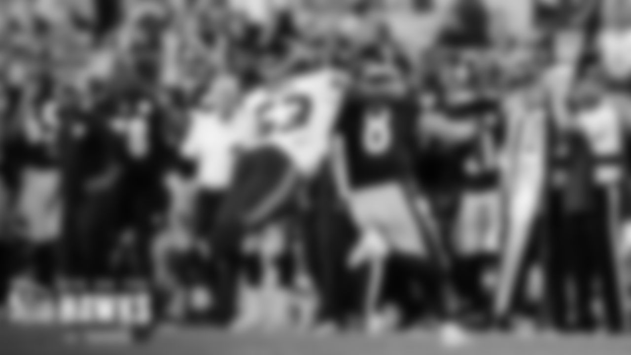 Boye Mafe chases down and sacks Steelers quarterback Kenny Pickett on fourth down to give the Seahawks the ball late in the game.