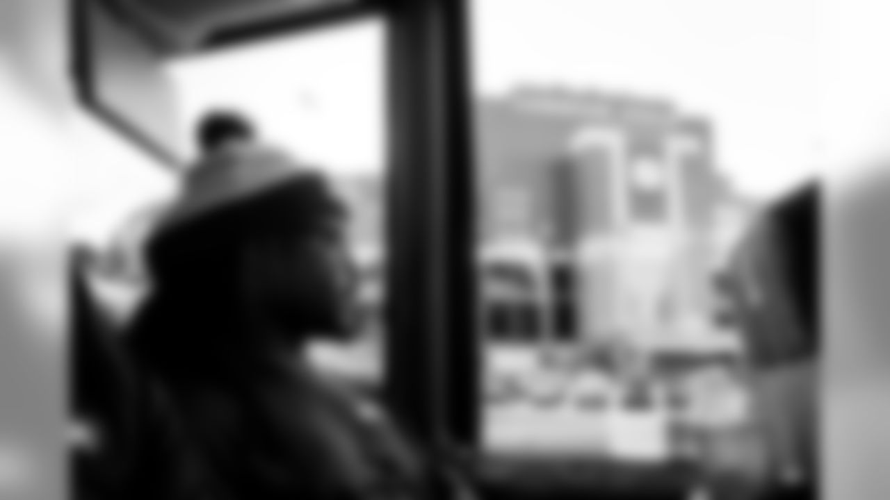 Running back Eddie Lacy looks out the window as the team's buses approached Lambeau Field for a visit on Saturday. Lacy played for the Packers for four seasons before joining the Seahawks this year.