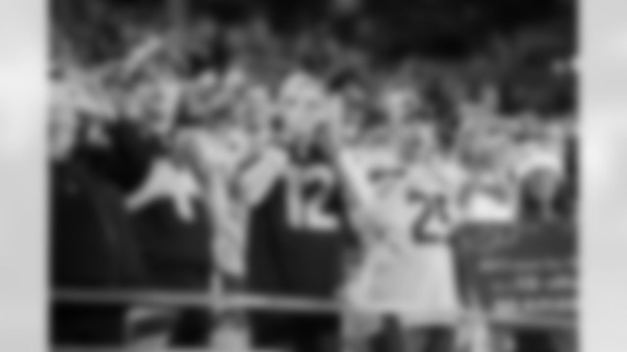 [October 12, 2003]: Seahawks 20 – 49ers 19Seattle Seahawks' Antonio Cochran (78) celebrates a fumble recovery by teammate safety Ken Hamlin on the first play after the 2-minute warning in the fourth quarter against the San Francisco 49ers, Sunday, Oct. 12, 2003, in Seattle. The Seahawks won 20-19. At left is 49ers' Ron Stone. (AP Photo/Elaine Thompson)