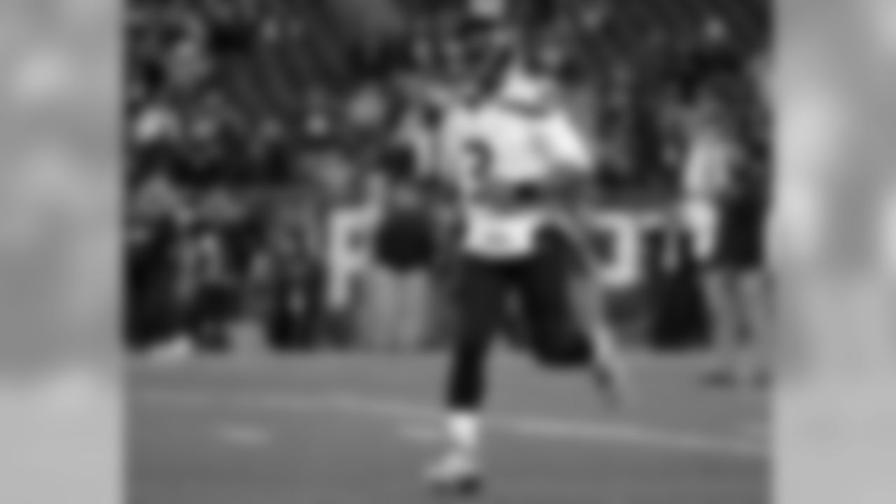 Seattle Seahawks quarterback Russell Wilson runs onto the field to warm up before an NFL football game against the New England Patriots, Sunday, Nov. 13, 2016, in Foxborough, Mass. (AP Photo/Steven Senne)