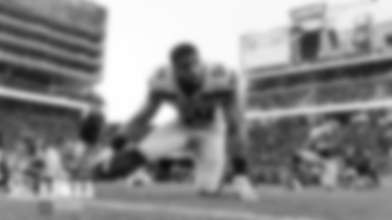 Defensive captain Bobby Wagner stretches during pregame.