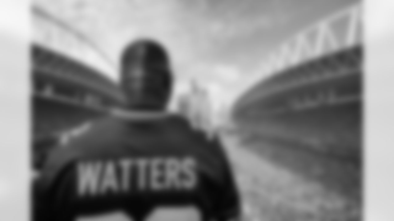 Seahawks Legend Ricky Watters raises the 12 Flag ahead of the season debut against the L.A. Rams at Lumen Field in Seattle, Wash. on September 10, 2023.