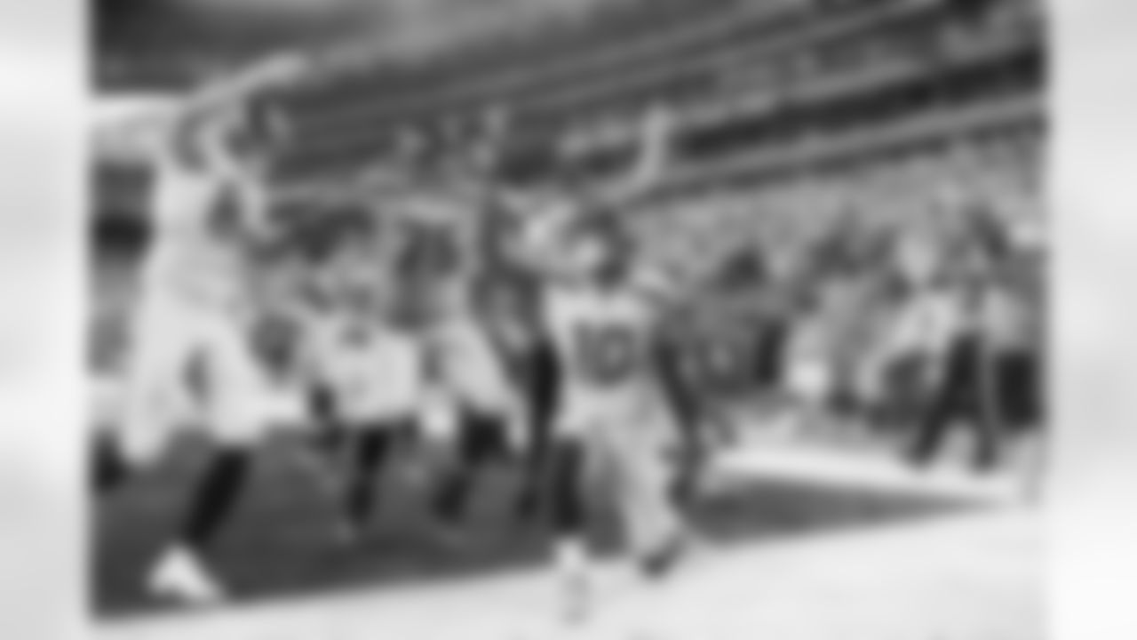 Paul Richardson celebrates his touchdown with teammates Luke Willson and Oday Aboushi.