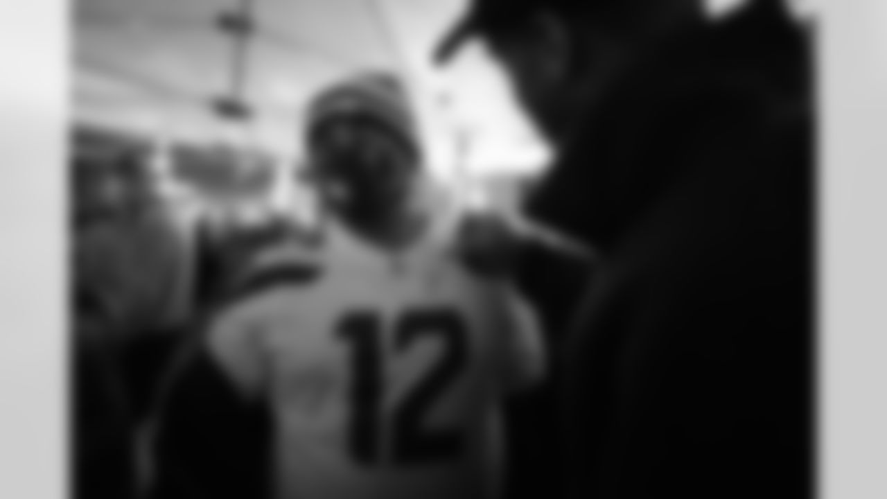 Seahawks quarterback Geno Smith helps pass out turkeys in advance of Thanksgiving on November 21, 2022.