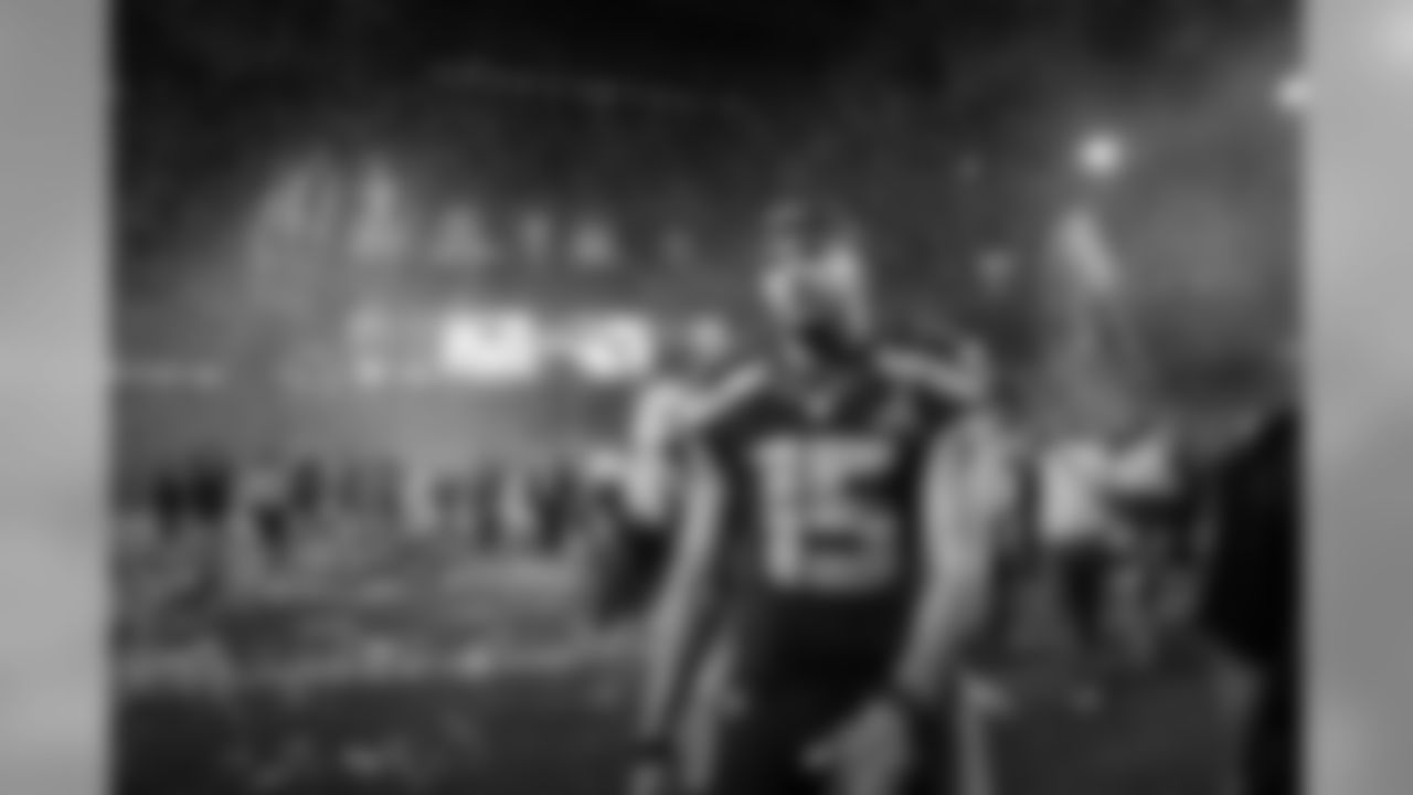Receiver Jermaine Kearse walks off the field at University of Phoenix Stadium after the game.