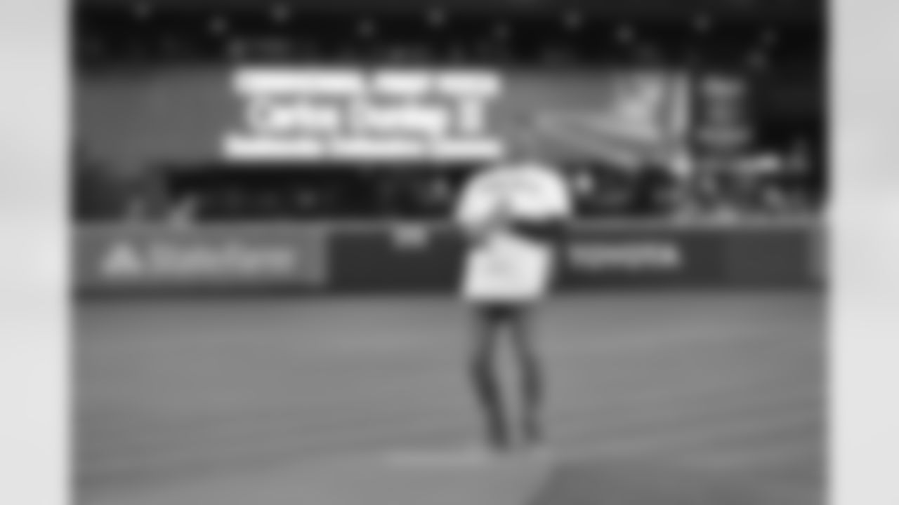 Carlos Dunlap II throws out the first pitch at the Mariners game on September 27, 2021.