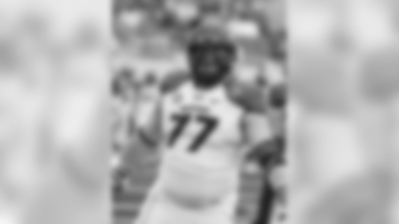 Missouri offensive lineman Evan Boehm (77) warms up prior to the Citrus Bowl NCAA college football game against Minnesota in Orlando, Fla., Thursday, Jan. 1, 2015. (AP Photo/John Raoux)