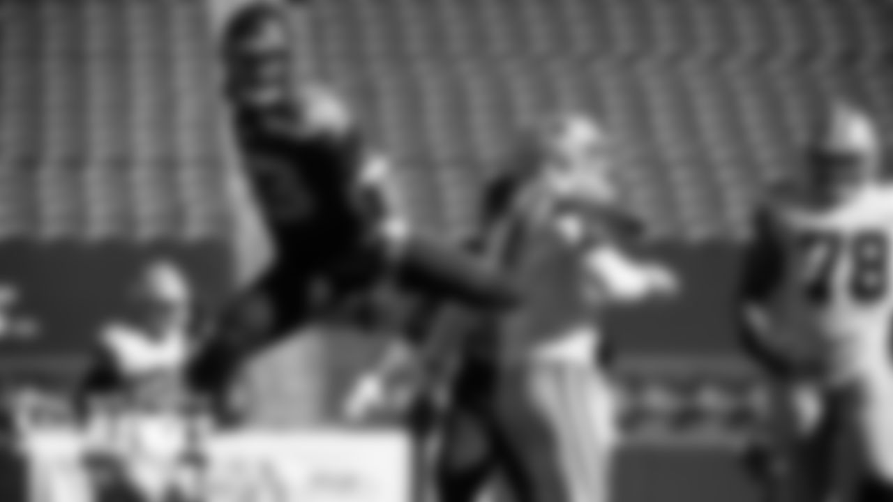Seahawks safety Jamal Adams flies by Cowboys quarterback Dak Prescott on a blitz.